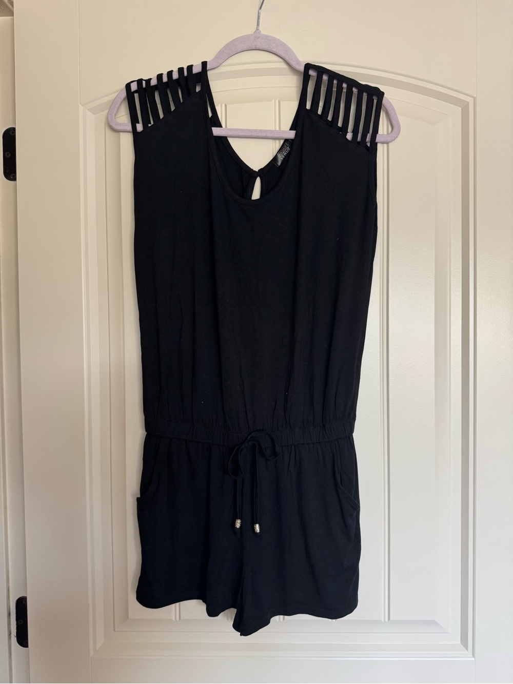 Black Sleeveless Romper with Ladder-Detail Shoulders
